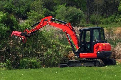 mini excavator mower attachment|excavator with bush hog attachment.